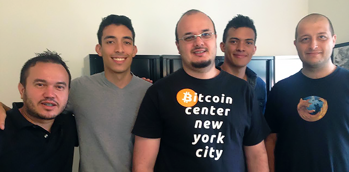 New York City: Rodrgio Souza of BlinkTrade is in the center, flanked by the Charles brothers of SurBitcoin, and then members of his staff.