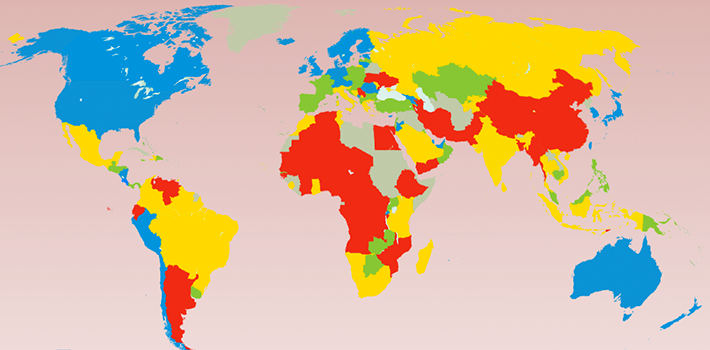 The index divides countries into quartiles of decreasing economic freedom: blue (most free), green, yellow, and red (least free).