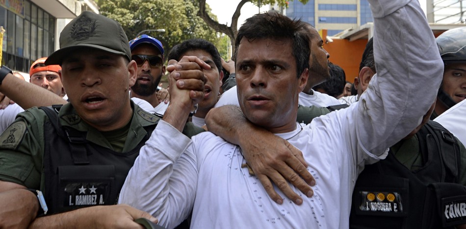 Leopoldo López surrendering to police last February