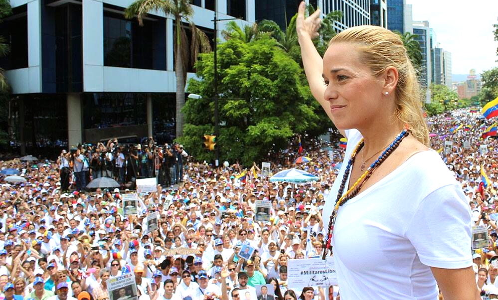 Many thousands of Caracas residents came together with Leopoldo López's wife Lilian Tintori (pictured) to demonstrate their support for her husband and other political prisoners in Venezuela. (<a href=